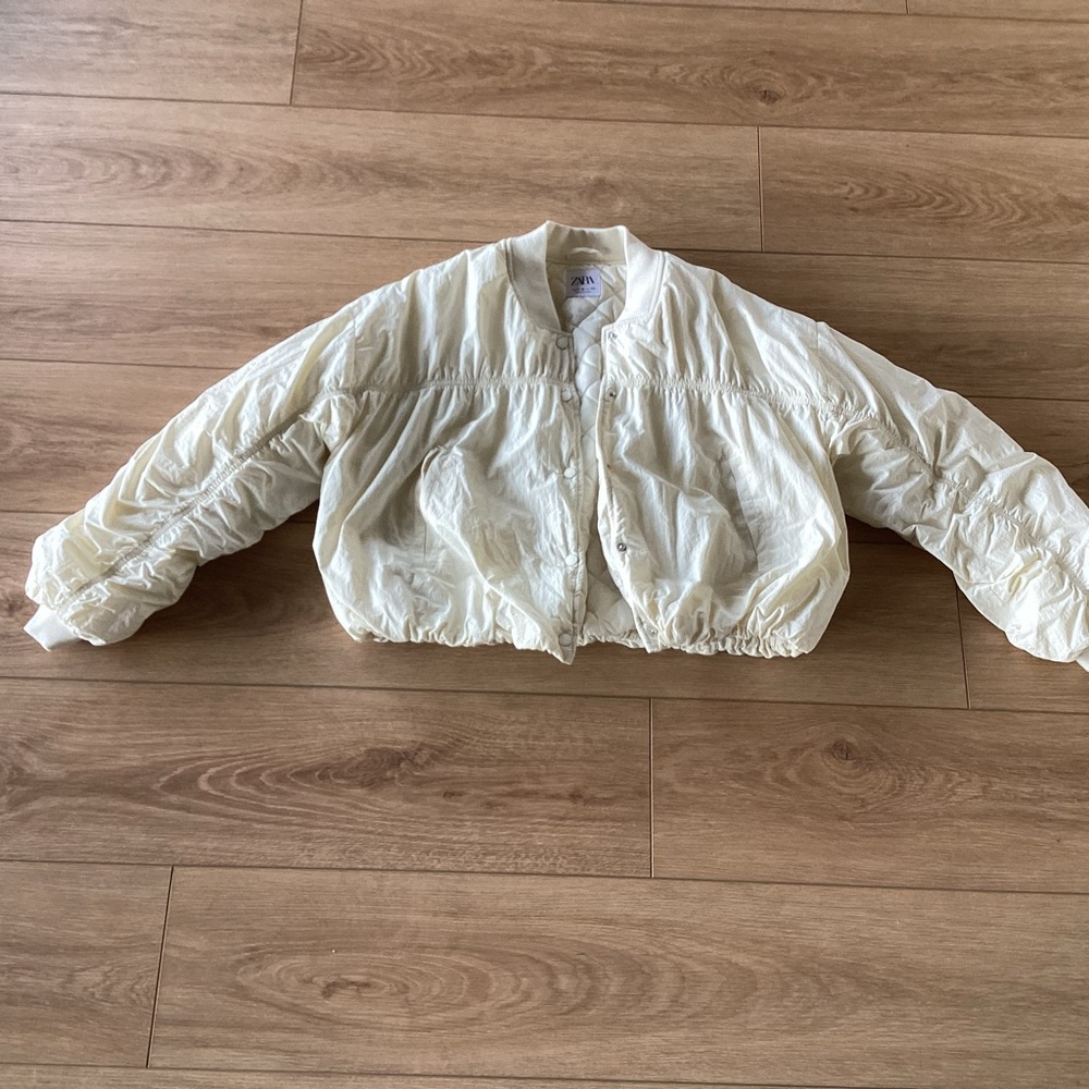 Zara Cream puffer jacket.